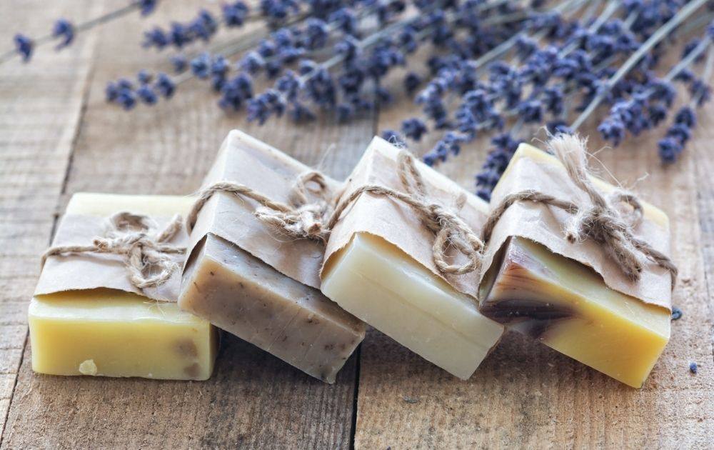 Handmade natural soaps wrapped in brown paper with a jute string